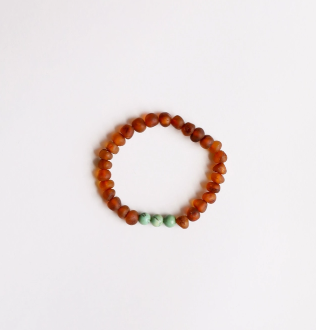 These Raw Cognac Baltic Amber + Turquoise Jasper || Bracley - Adult by Canyon Leaf are hand strung with amber beads that are smooth and round; on a clear gum elastic stretch cord so that the bracelet may be worn with ease. CanyonLeaf Baltic Sea Amber + Gemstone Jewelry is made for wearing, not for chewing.&nbsp;